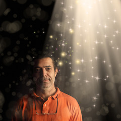 Wall Mural - Conceptual portrait of adult man with beam of light and abstract light manipulation.