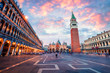 Fantastic sanset on San Marco square with Campanile and Saint Mark's Basilica. Colorful evening cityscape of Venice, Italy, Europe. Traveling concept background. Artistic style post processed photo.