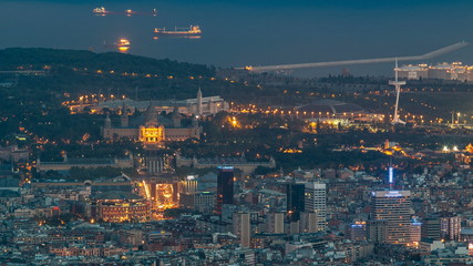 Wall Mural - Top view from tibidabo of National Art Museum timelapse at Placa Espanya in Barcelona day to night, Catalonia, Spain