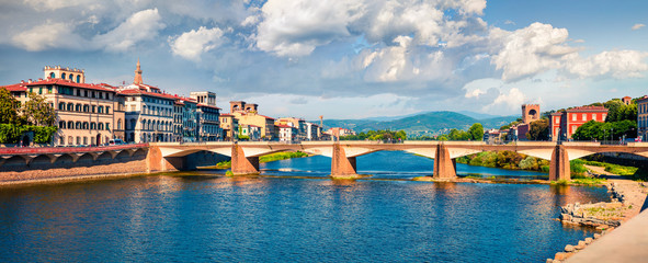 Canvas Print - Picturesque morning scene with Ponte alle Grazie bridge over Arno river. Colorful spring view of Florence, Italy, Europe. Traveling concept background.