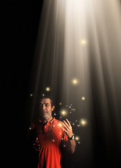 Wall Mural - Conceptual portrait of adult man with beam of light and abstract light manipulation.