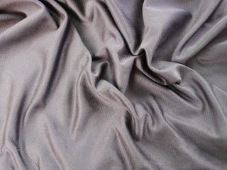 black fabric cloth background,texture of sportswear,silk satin