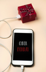 Poster - gift and text happy cyber monday in a smartphone