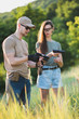 © johnalexandr - the instructor teaches the girl to shoot a pistol at the range
