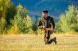 © be free - Man charging hunting rifle. Hunting as male hobby and leisure. Hunting shooting trophy. Hunter khaki clothes ready to hunt hold gun mountains background. Hunter with rifle looking for animal
