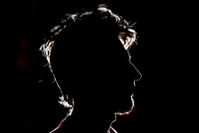 Silhouette Of Man Head On Dark Black Background With Lighten Circuit Contour F