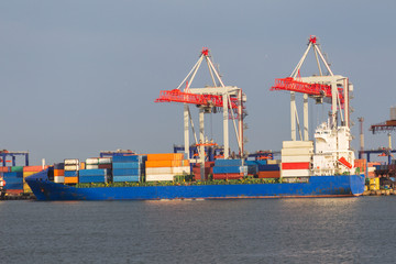 A large large cargo ship enters the harbor of a container terminal in the Odessa seaport, the largest Ukrainian seaport and a large cargo and passenger transport hub of Ukraine