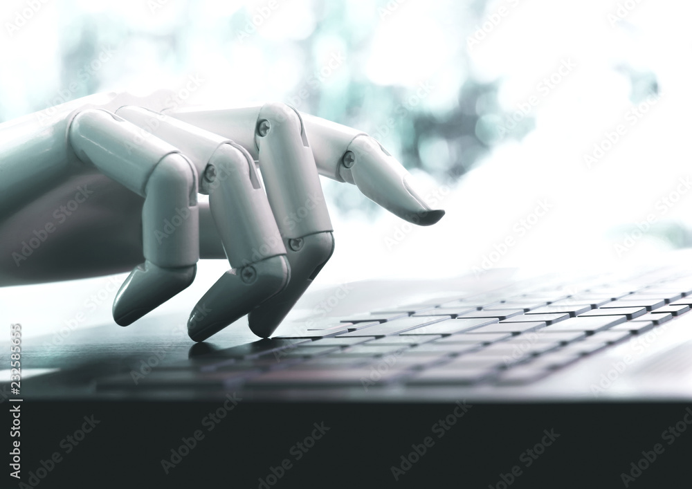 Robot concept or robot hand chatbot pressing computer keyboard enter