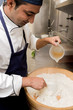 © Stocksy - Man cooking rice for special dish