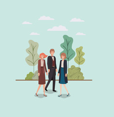 Wall Mural - elegant businesspeople walking in the park