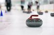 © Stocksy - Curling: Thrown Stone Sits On Ice