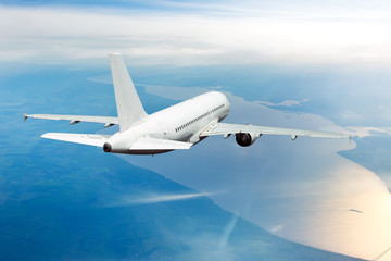 Passenger aircraft view from behind. The plane flies away.