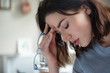 © Stocksy - Woman with headache