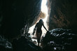 © Stocksy - Woman surfing at wild tropical beach