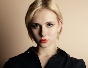 Portrait of a beautiful young woman with blue eyes.