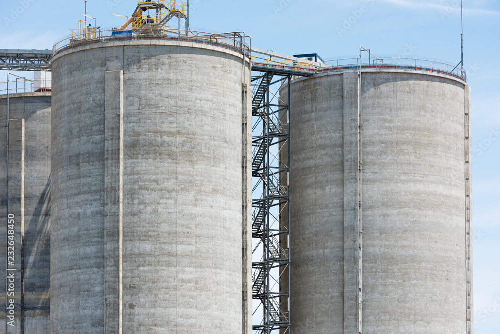 Large industrial storage tanks Stock Photo | Adobe Stock