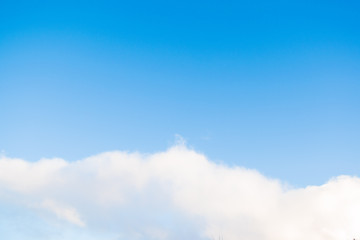 clouds in the bright blue sky
