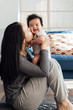 © Stocksy - Young mother and her new born baby at home