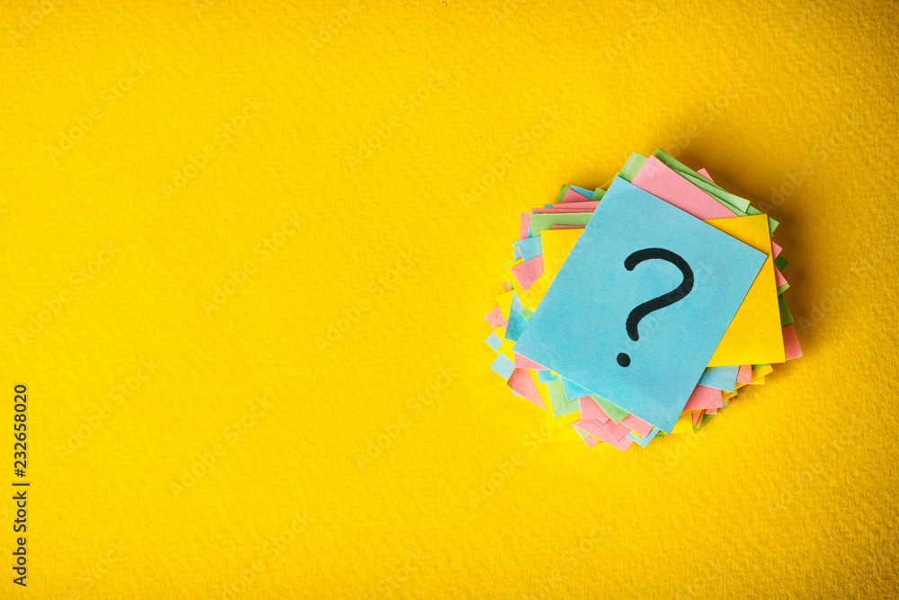 question marks written reminders tickets on yellow vintage paper background - obrazy, fototapety, plakaty 