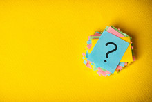 Question Marks Written Reminders Tickets On Yellow Vintage Paper Background