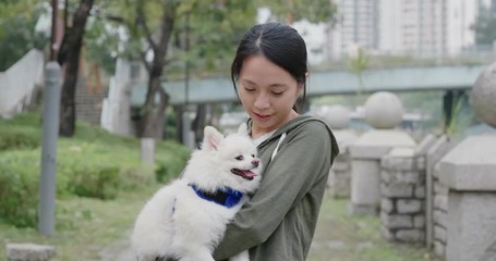 Canvas Print - Woman with her Pomeranian dog