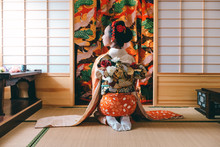 Asian Woman In Traditional Kimono Clothing