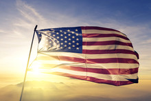 United States US American USA Flag Textile Cloth Fabric Waving On The Top Sunrise Mist Fog