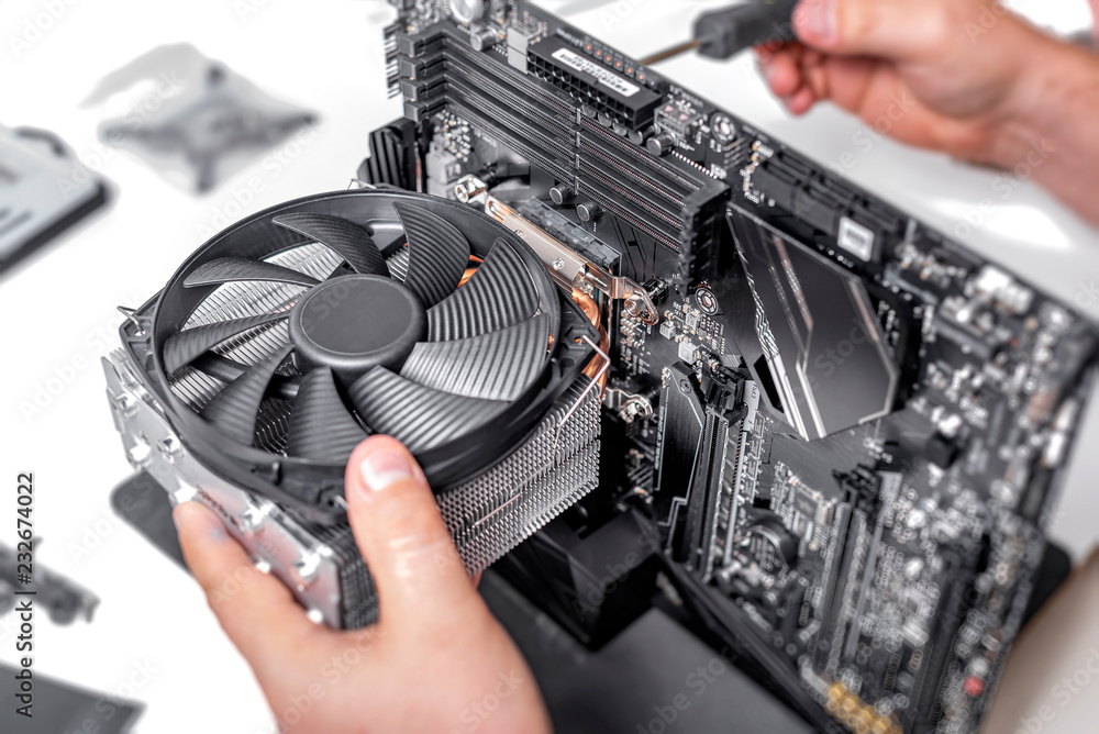 Installing or repair the air cooling system of the PC processor. - obrazy, fototapety, plakaty 