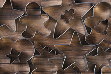 Closeup overhead view of a group of assorted cookie cutters