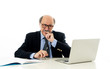 © SB Arts Media - Overwhelmed and tired old businessman working with laptop feeling angry at office