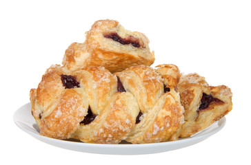 Wall Mural - Cherry fruit tarts on a porcelain plate isolated on white background. One of the more popular flavored pies in America.