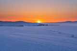 Fototapeta Dziecięca - Panoramic frozen landscape in winter sunset at frozen lake Baikal in Siberia, Russia