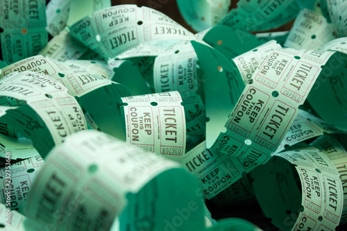Fotografía Unrolled roll of green admit one raffle tickets