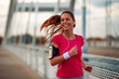 © ivanko80 - Young fitness woman running in the city