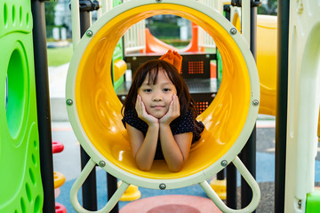 Smiling Little Girl having Fun on Playground.