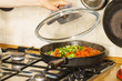 © Voyagerix - Chopped vegetables on frying pan