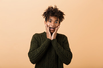 Sticker - Portrait of a happy young african man dressed in sweater