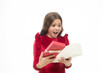 © be free - Small cute girl received holiday gift. What is inside. Worst toys and christmas gifts for kids. Kid little girl elegant dress curly hairstyle hold gift box. Child disappointed by unpacking her gift