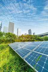 Wall Mural - ecological energy renewable solar panel plant with urban landscape landmarks