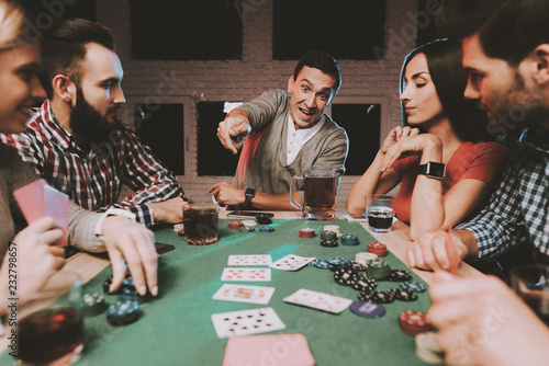 Young Friends Playing Poker On Party At Home Stock Photo Adobe Stock Young Friends Playing Poker On Party At Home Stock Photo Adobe Stock