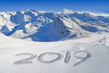 Wall Mural - 2019 written in the snow, mountain landscape in the background