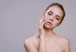 © Alena - Beautiful young woman with clean fresh skin. Facial treatment. Cosmetology, beauty and spa. Skin care concept