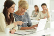 © aletia2011 - Portrait of women working together in office