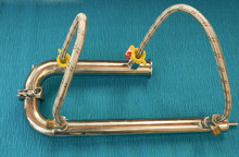 Clip For Connecting Metal Pipes In The Distiller, Clips On A Blue Background For Fastening Metal Pipes, Metal Pipes For Water Supply With Water Hoses.