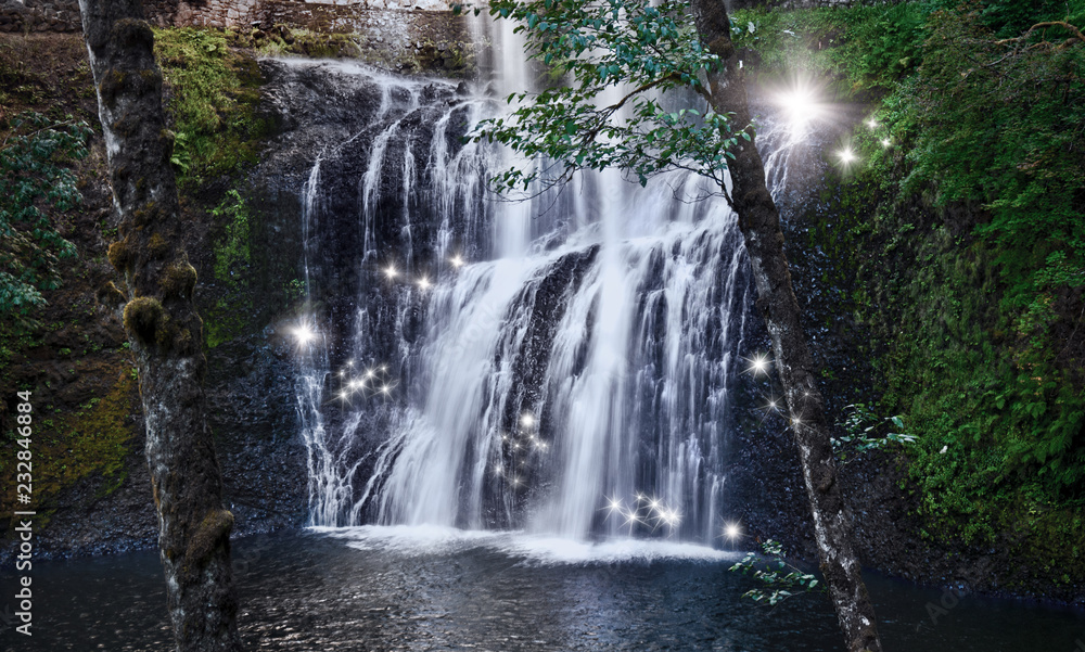 Waterfall with dancing fairy lights in enchanted forest/Glowing fairy ...
