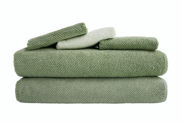 Green bath towels in stack isolated over white