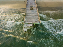 Aerial Drone Image Of A Hurricane Storm Damaged Fishing Pier On The Atlantic Ocean Off The South Carolina Coast