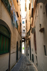 Wall Mural - Narrow street in the old town in Italy