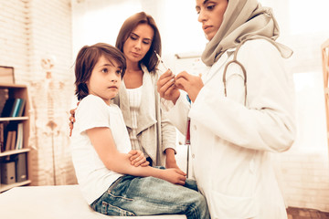 Wall Mural - Arabic Female Doctor Hold Syringe with Injection