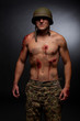 a military soldier struggles show his scars with open wounds